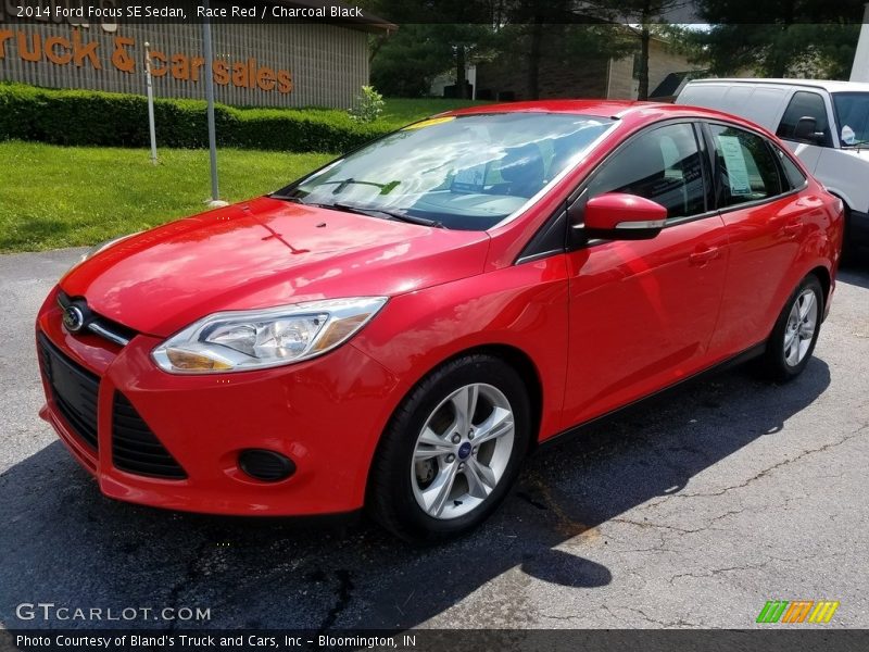 Race Red / Charcoal Black 2014 Ford Focus SE Sedan