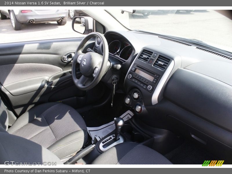 Brilliant Silver / Charcoal 2014 Nissan Versa 1.6 SV Sedan