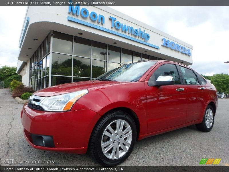 Sangria Red Metallic / Charcoal Black 2011 Ford Focus SEL Sedan