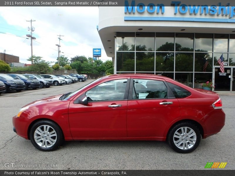 Sangria Red Metallic / Charcoal Black 2011 Ford Focus SEL Sedan