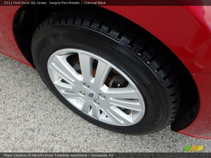 Sangria Red Metallic / Charcoal Black 2011 Ford Focus SEL Sedan