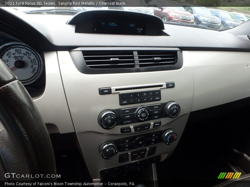 Sangria Red Metallic / Charcoal Black 2011 Ford Focus SEL Sedan