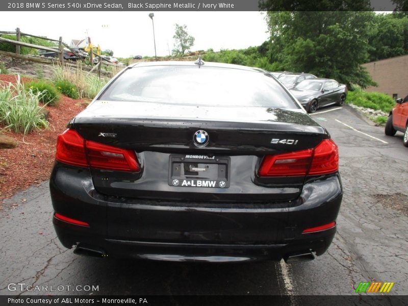 Black Sapphire Metallic / Ivory White 2018 BMW 5 Series 540i xDrive Sedan