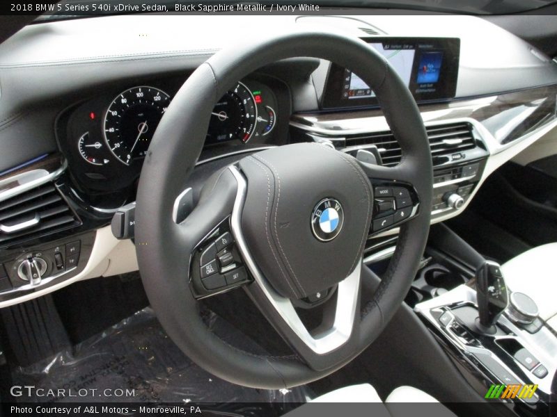 Black Sapphire Metallic / Ivory White 2018 BMW 5 Series 540i xDrive Sedan