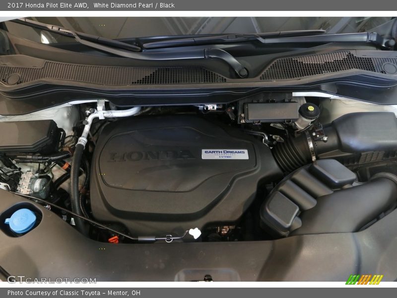 White Diamond Pearl / Black 2017 Honda Pilot Elite AWD