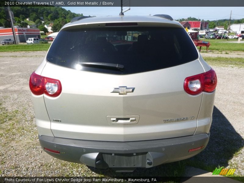 Gold Mist Metallic / Ebony 2010 Chevrolet Traverse LT AWD