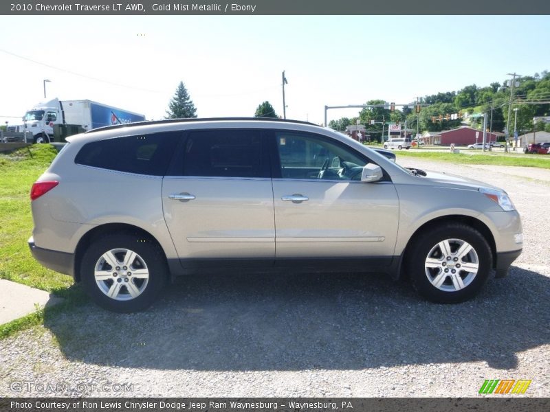 Gold Mist Metallic / Ebony 2010 Chevrolet Traverse LT AWD