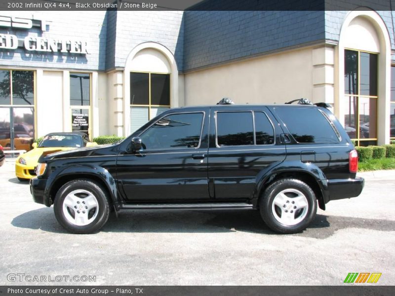 Black Obsidian / Stone Beige 2002 Infiniti QX4 4x4