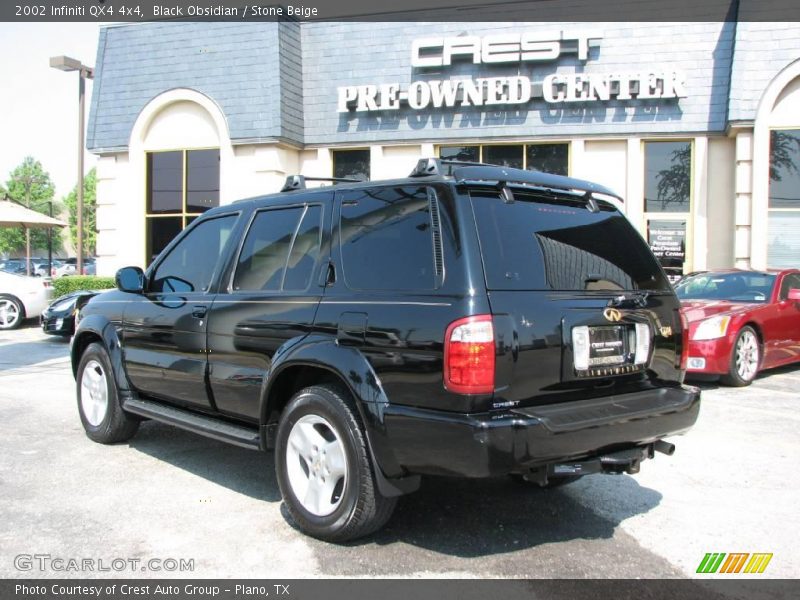 Black Obsidian / Stone Beige 2002 Infiniti QX4 4x4