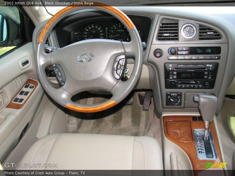 Black Obsidian / Stone Beige 2002 Infiniti QX4 4x4