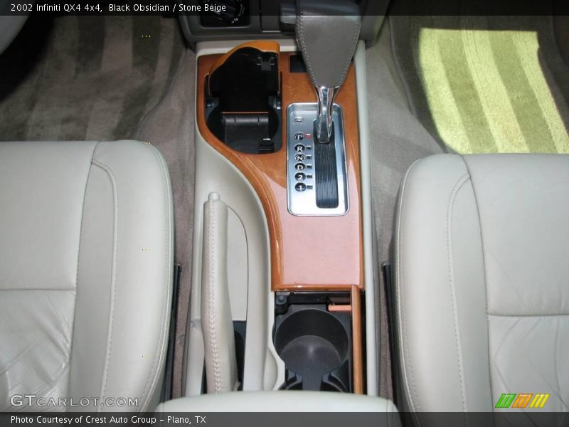 Black Obsidian / Stone Beige 2002 Infiniti QX4 4x4