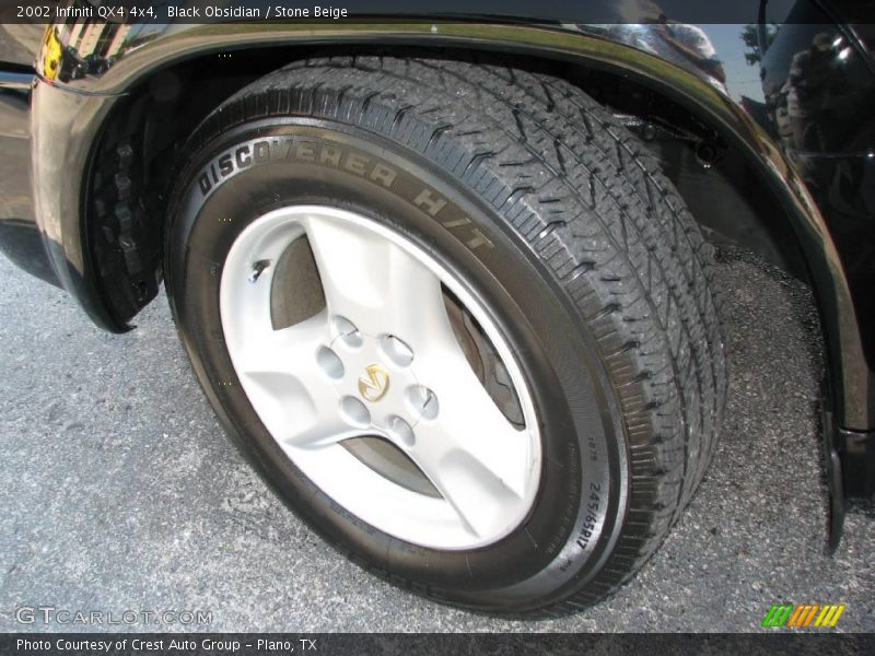 Black Obsidian / Stone Beige 2002 Infiniti QX4 4x4