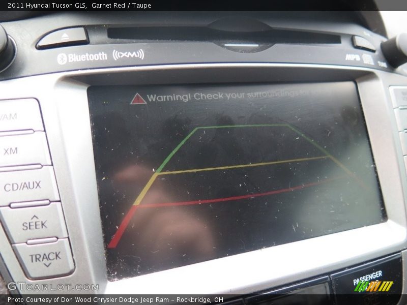 Garnet Red / Taupe 2011 Hyundai Tucson GLS