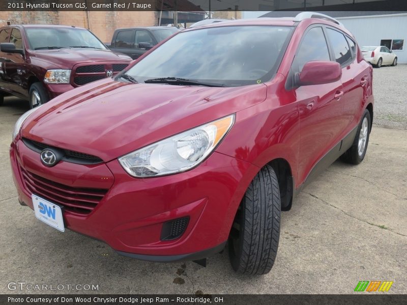 Garnet Red / Taupe 2011 Hyundai Tucson GLS
