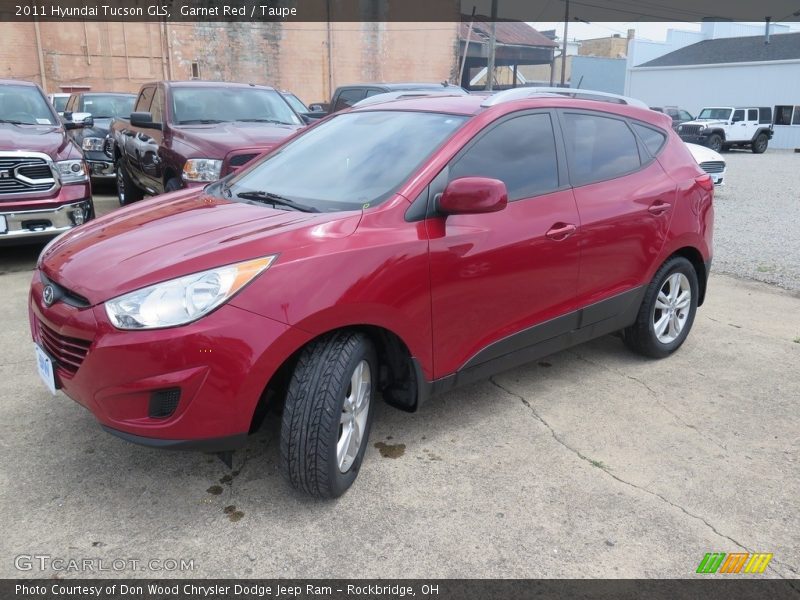 Garnet Red / Taupe 2011 Hyundai Tucson GLS