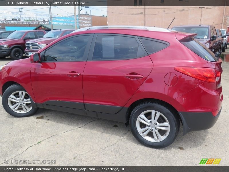 Garnet Red / Taupe 2011 Hyundai Tucson GLS