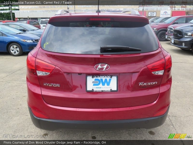 Garnet Red / Taupe 2011 Hyundai Tucson GLS