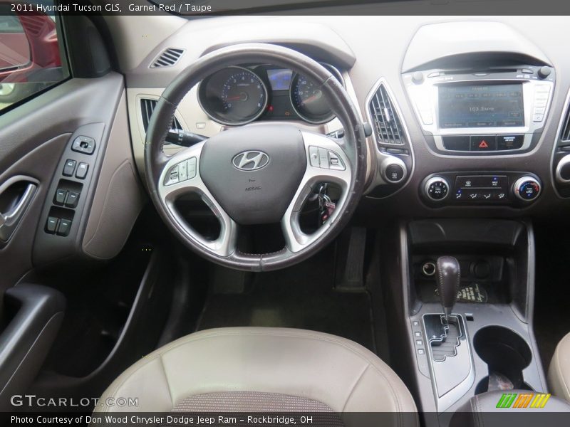 Garnet Red / Taupe 2011 Hyundai Tucson GLS