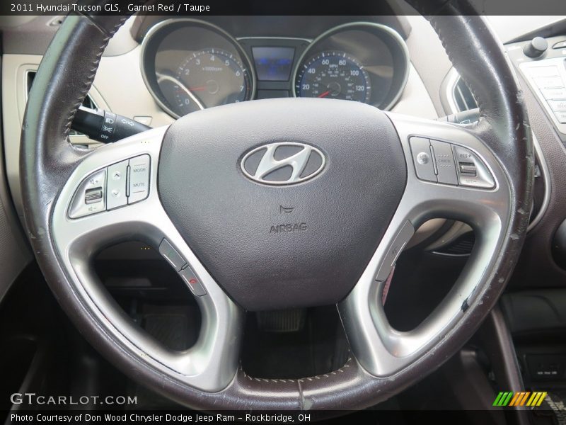 Garnet Red / Taupe 2011 Hyundai Tucson GLS