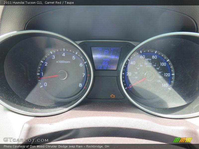 Garnet Red / Taupe 2011 Hyundai Tucson GLS