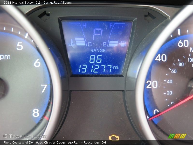 Garnet Red / Taupe 2011 Hyundai Tucson GLS