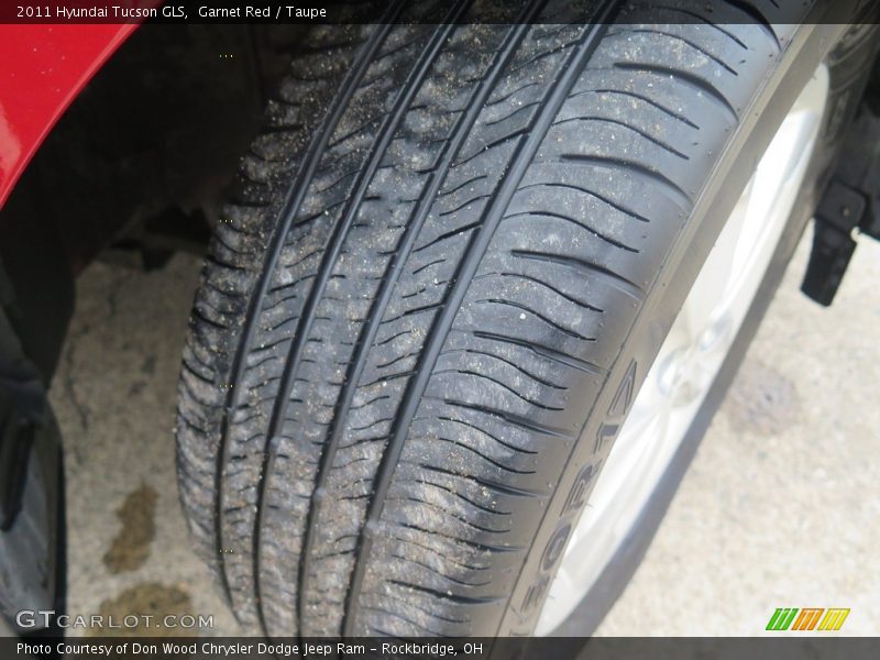 Garnet Red / Taupe 2011 Hyundai Tucson GLS