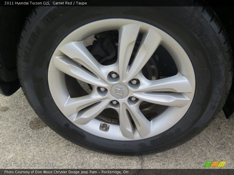Garnet Red / Taupe 2011 Hyundai Tucson GLS