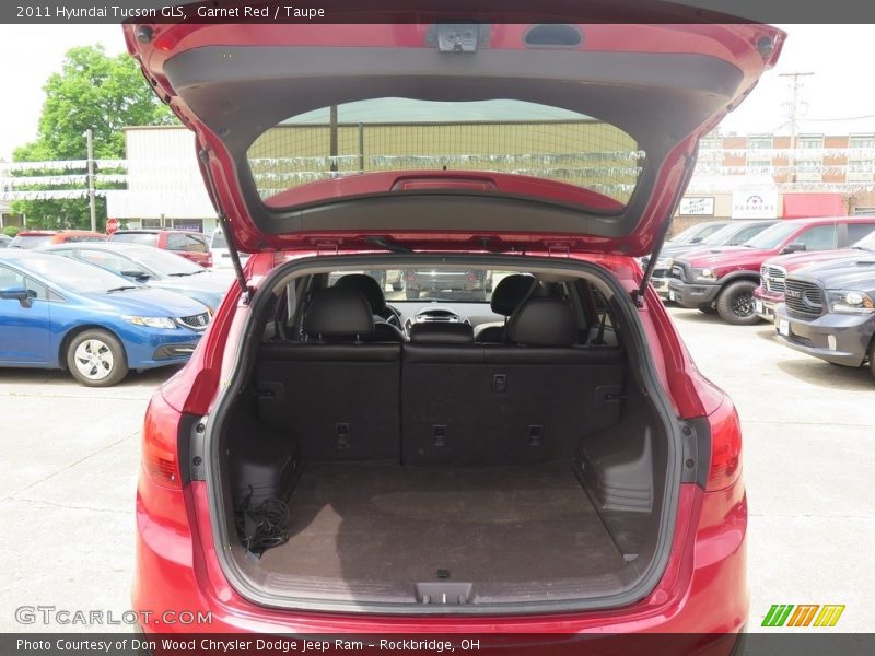 Garnet Red / Taupe 2011 Hyundai Tucson GLS