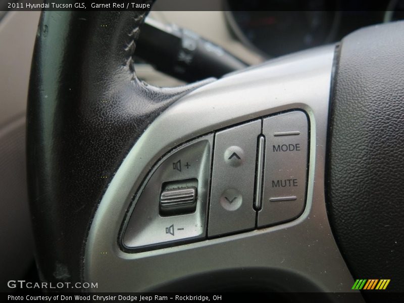Garnet Red / Taupe 2011 Hyundai Tucson GLS