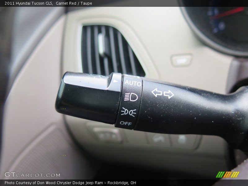 Garnet Red / Taupe 2011 Hyundai Tucson GLS