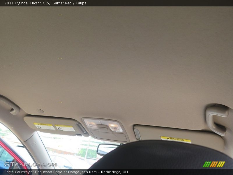 Garnet Red / Taupe 2011 Hyundai Tucson GLS