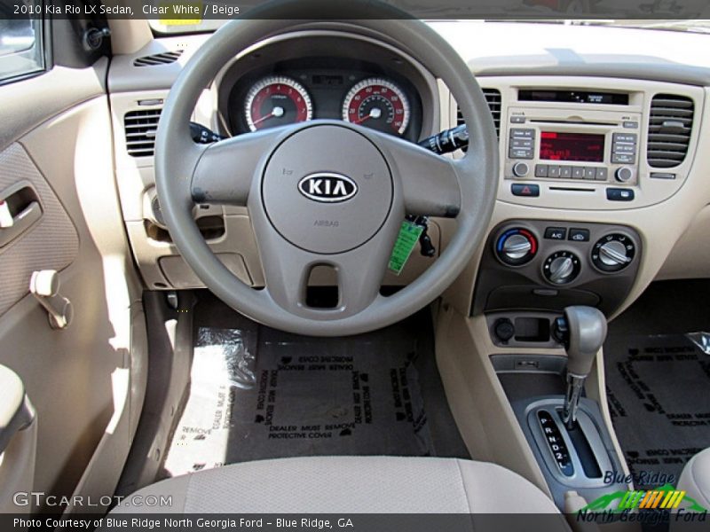 Clear White / Beige 2010 Kia Rio LX Sedan