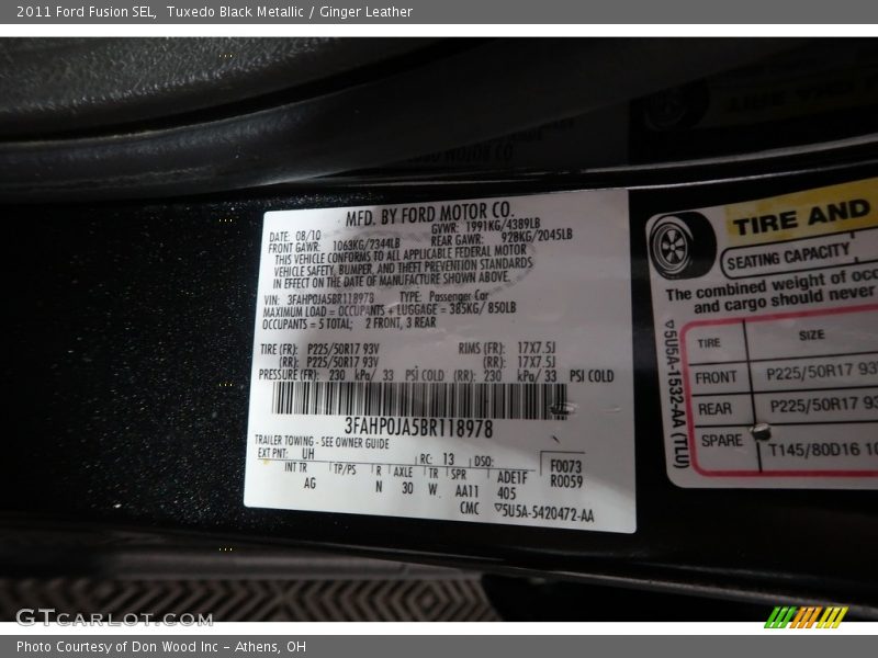 Tuxedo Black Metallic / Ginger Leather 2011 Ford Fusion SEL