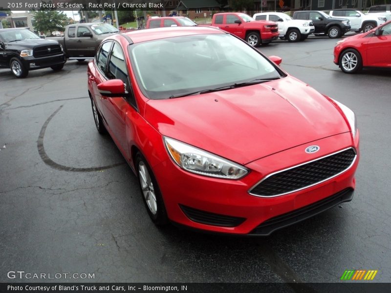 Race Red / Charcoal Black 2015 Ford Focus SE Sedan
