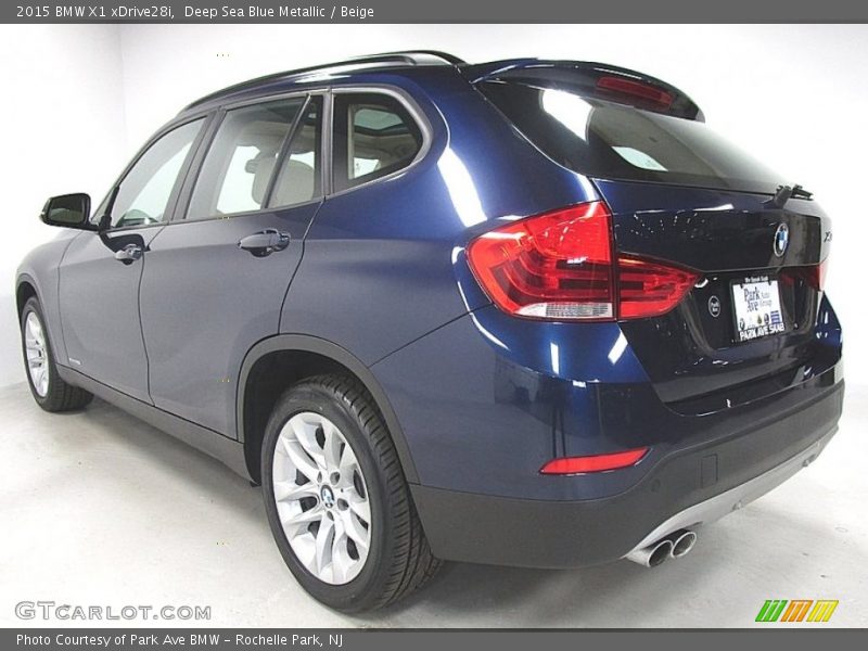 Deep Sea Blue Metallic / Beige 2015 BMW X1 xDrive28i