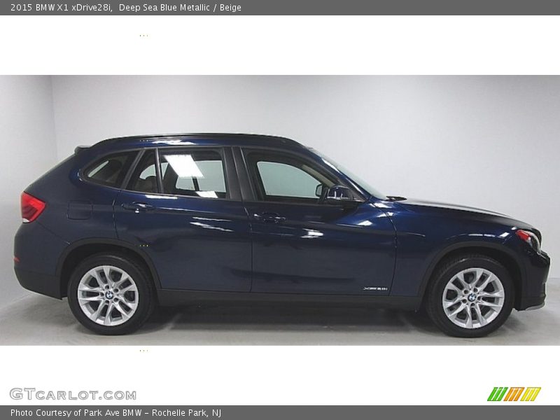 Deep Sea Blue Metallic / Beige 2015 BMW X1 xDrive28i
