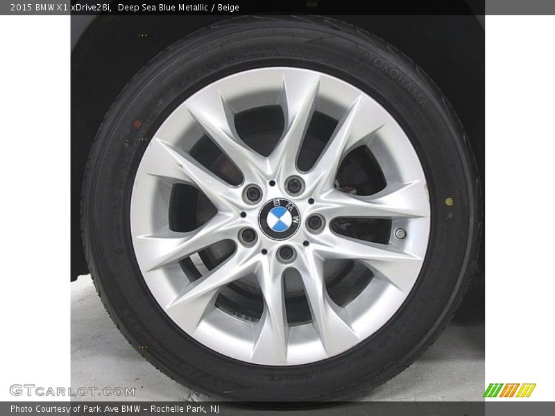 Deep Sea Blue Metallic / Beige 2015 BMW X1 xDrive28i
