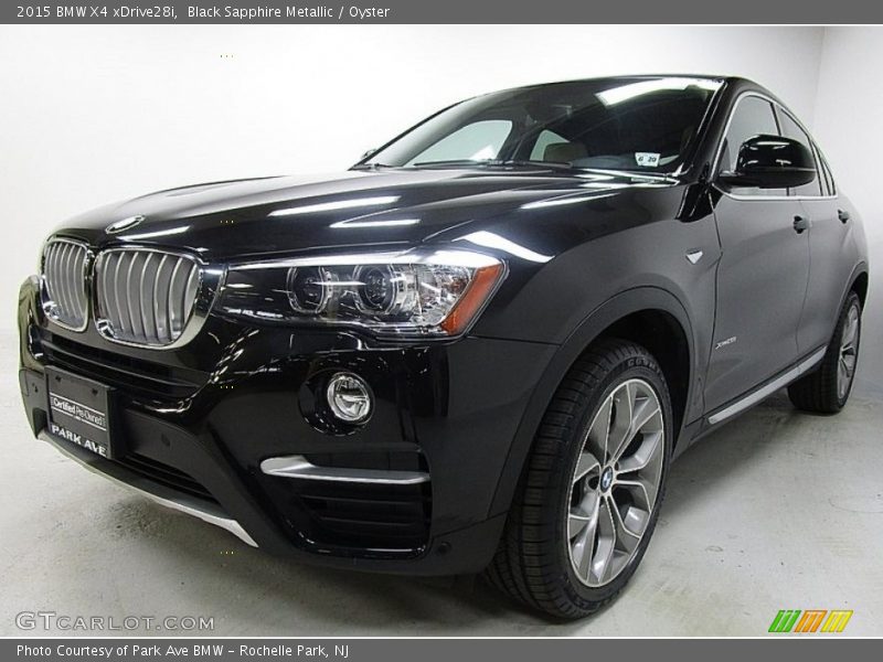 Black Sapphire Metallic / Oyster 2015 BMW X4 xDrive28i