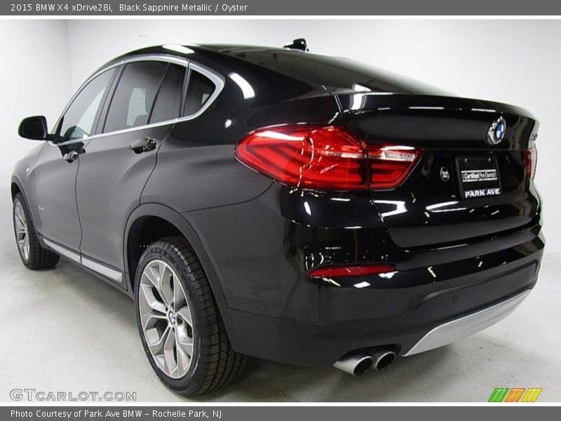 Black Sapphire Metallic / Oyster 2015 BMW X4 xDrive28i