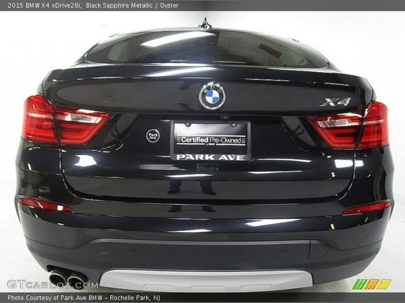 Black Sapphire Metallic / Oyster 2015 BMW X4 xDrive28i