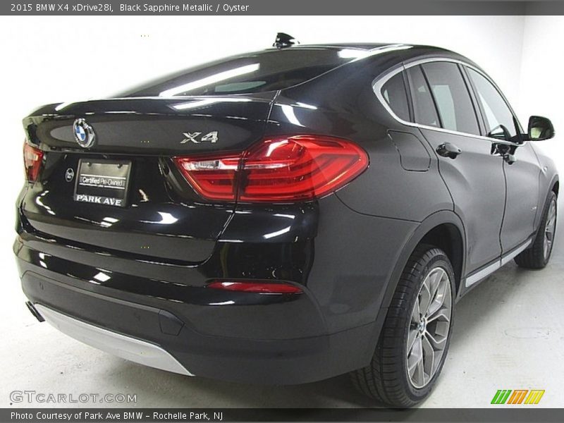 Black Sapphire Metallic / Oyster 2015 BMW X4 xDrive28i