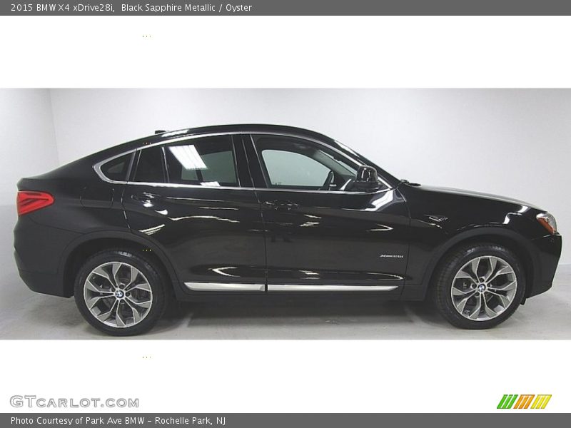 Black Sapphire Metallic / Oyster 2015 BMW X4 xDrive28i
