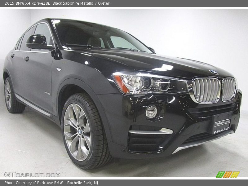 Black Sapphire Metallic / Oyster 2015 BMW X4 xDrive28i