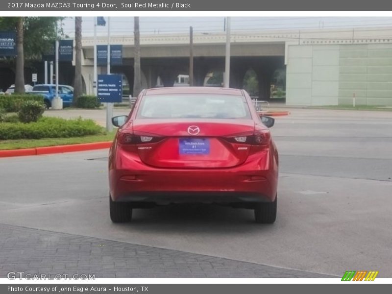 Soul Red Metallic / Black 2017 Mazda MAZDA3 Touring 4 Door