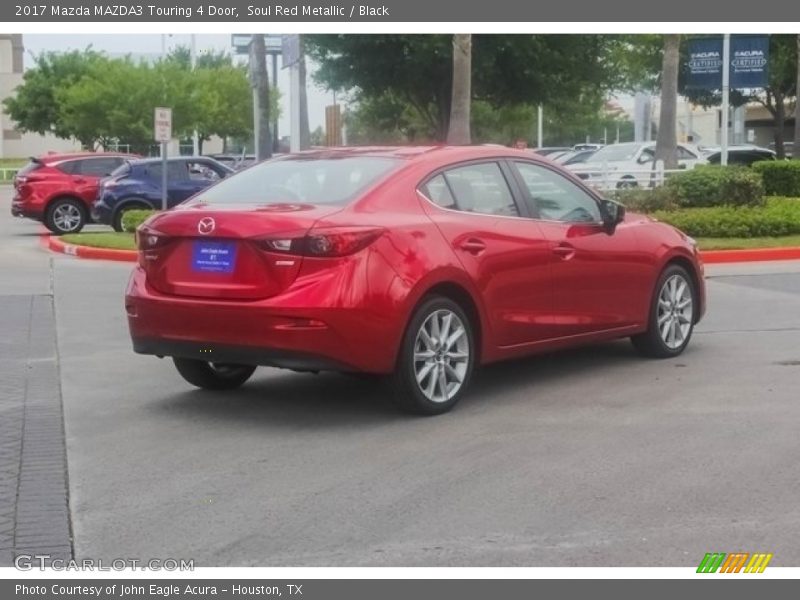 Soul Red Metallic / Black 2017 Mazda MAZDA3 Touring 4 Door