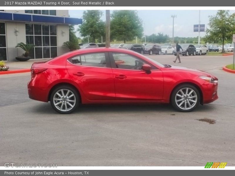 Soul Red Metallic / Black 2017 Mazda MAZDA3 Touring 4 Door