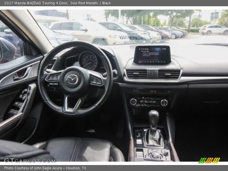 Soul Red Metallic / Black 2017 Mazda MAZDA3 Touring 4 Door