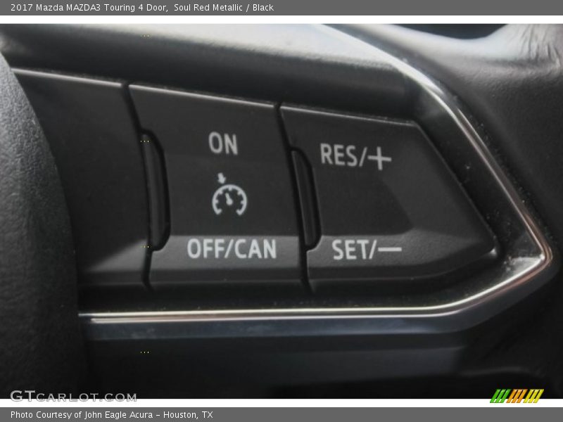 Soul Red Metallic / Black 2017 Mazda MAZDA3 Touring 4 Door