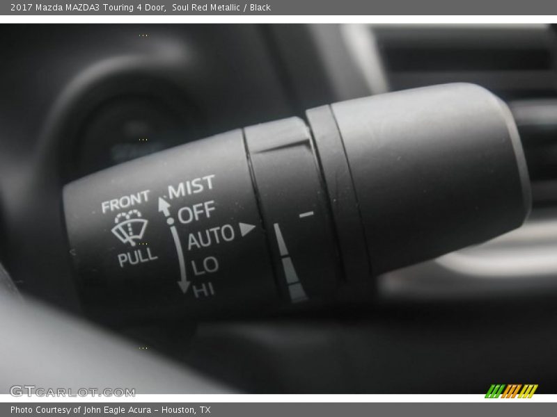 Soul Red Metallic / Black 2017 Mazda MAZDA3 Touring 4 Door