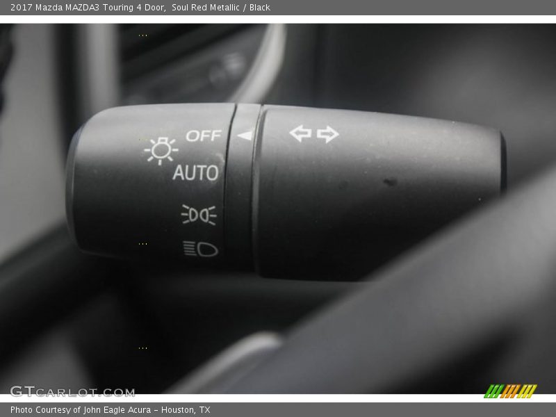 Soul Red Metallic / Black 2017 Mazda MAZDA3 Touring 4 Door